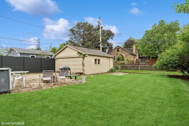 5748 N Lansing Ave, Chicago, IL 60646 - view of yard featuring a patio area and a detached garage
