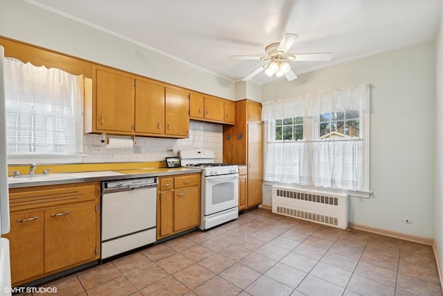 5748 N Lansing Ave, Chicago, IL 60646 - kitchen with radiator, white appliances, backsplash, a ceiling fan, and light countertops