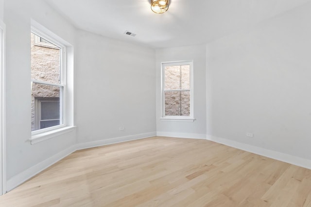 6233 S Woodlawn Ave Unit 2, Chicago, IL 60637 - unfurnished room featuring light wood-style flooring and baseboards