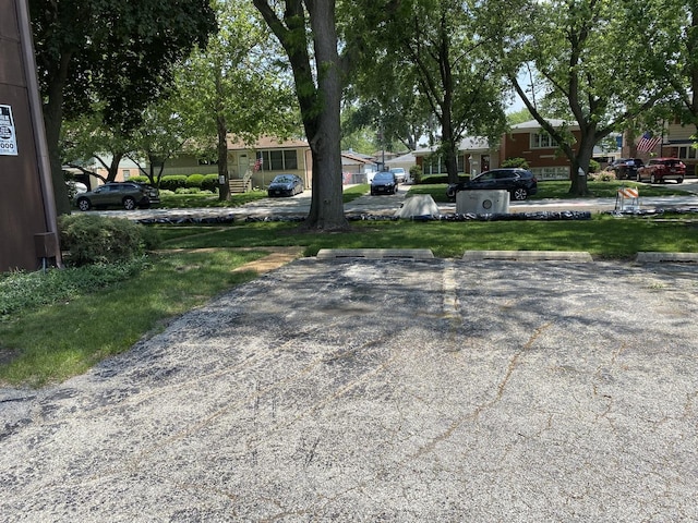 17612 71st Ct Unit 1N, Tinley Park, IL 60477 - view of road featuring a residential view