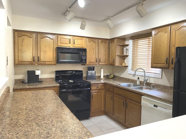 17612 71st Ct Unit 1N, Tinley Park, IL 60477 - kitchen with black appliances, a sink, track lighting, brown cabinetry, and light tile patterned floors