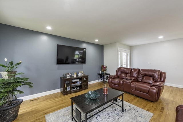 3106 Lebanon Ave, Zion, IL 60099 - living area with wood finished floors, baseboards, and recessed lighting