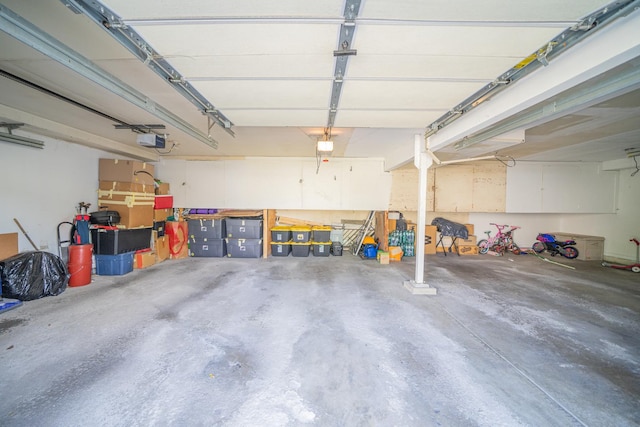 1352 Quaker Ln Unit 154C, Prospect Heights, IL 60070 - garage featuring a garage door opener