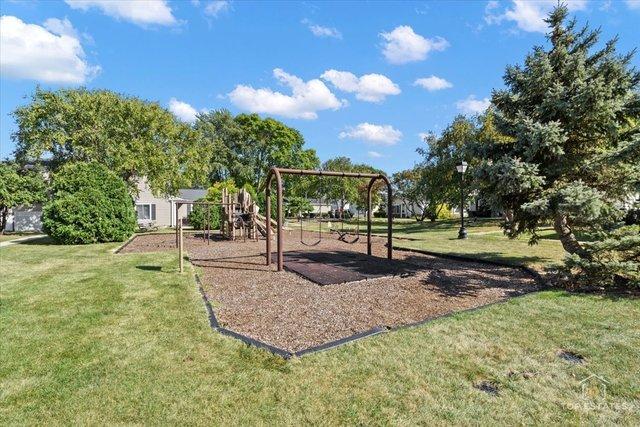 1352 Quaker Ln Unit 154C, Prospect Heights, IL 60070 - communal playground with a lawn