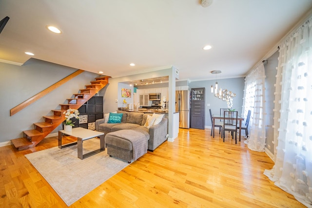 1352 Quaker Ln Unit 154C, Prospect Heights, IL 60070 - living room with ornamental molding, stairs, a chandelier, recessed lighting, and baseboards