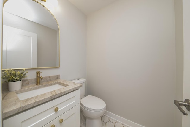 1770 Henley St Unit C, Glenview, IL 60025 - half bath with toilet, vanity, baseboards, and tile patterned flooring