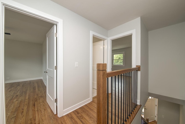 1770 Henley St Unit C, Glenview, IL 60025 - corridor featuring an upstairs landing, wood finished floors, and baseboards