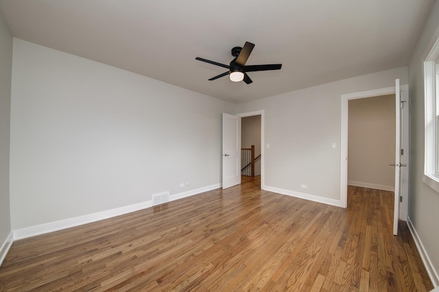 1770 Henley St Unit C, Glenview, IL 60025 - unfurnished bedroom with light wood-style flooring, baseboards, and a ceiling fan