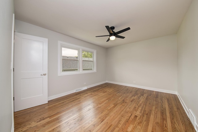 1770 Henley St Unit C, Glenview, IL 60025 - unfurnished room featuring light wood-style flooring, baseboards, and ceiling fan