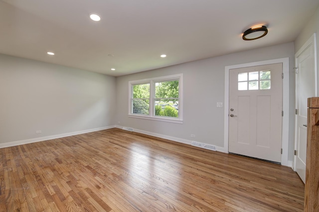1770 Henley St Unit C, Glenview, IL 60025 - foyer with light wood-style flooring, baseboards, and recessed lighting