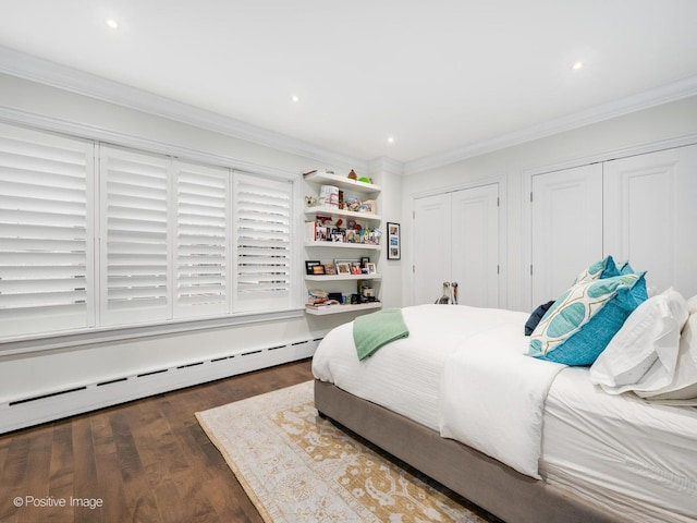 3920 N Lake Shore Dr Unit 12N, Chicago, IL 60613 - bedroom featuring baseboard heating, two closets, wood finished floors, ornamental molding, and recessed lighting