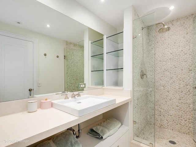 3920 N Lake Shore Dr Unit 12N, Chicago, IL 60613 - bathroom featuring a shower stall, vanity, and recessed lighting
