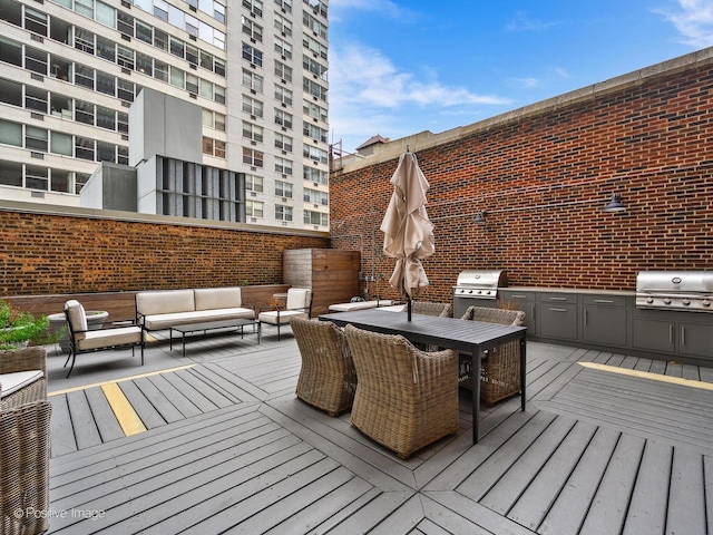 3920 N Lake Shore Dr Unit 12N, Chicago, IL 60613 - deck featuring an outdoor living space, area for grilling, and outdoor dining space