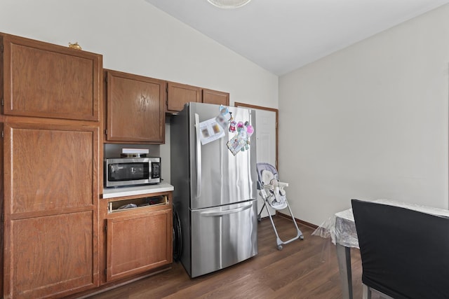 11036 Jodan Dr Unit 3D, Oak Lawn, IL 60453 - kitchen featuring stainless steel appliances, vaulted ceiling, dark wood-style flooring, light countertops, and brown cabinets
