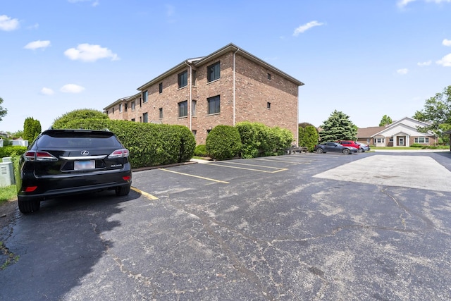 11036 Jodan Dr Unit 3D, Oak Lawn, IL 60453 - view of property featuring uncovered parking