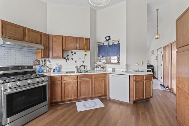 11036 Jodan Dr Unit 3D, Oak Lawn, IL 60453 - kitchen featuring stainless steel range with gas stovetop, under cabinet range hood, high vaulted ceiling, dishwasher, and a sink
