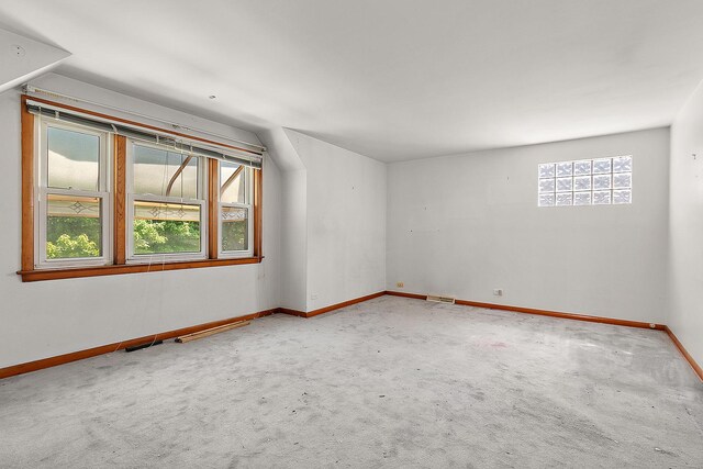 3840 S Wolcott Ave, Chicago, IL 60609 - carpeted spare room featuring baseboards