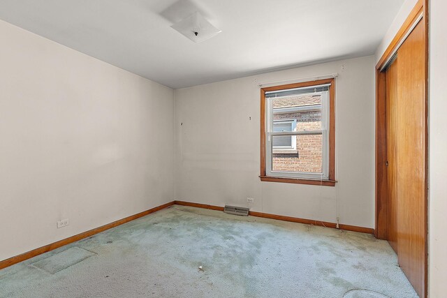 3840 S Wolcott Ave, Chicago, IL 60609 - empty room with light carpet and baseboards