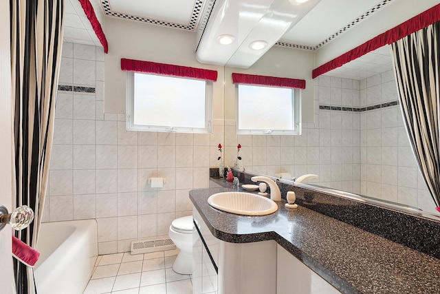 3840 S Wolcott Ave, Chicago, IL 60609 - bathroom featuring tile patterned floors, tile walls, toilet, shower / bathtub combination with curtain, and vanity