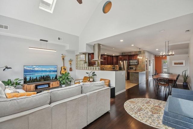 1830 W 18th St, Chicago, IL 60608 - living room with wood finished floors, lofted ceiling, a chandelier, and recessed lighting