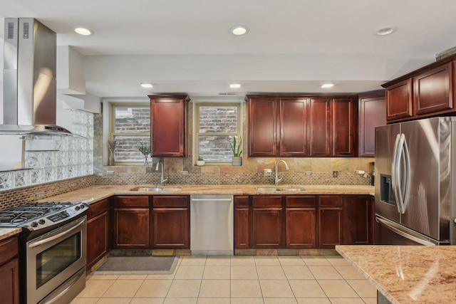 1830 W 18th St, Chicago, IL 60608 - kitchen with appliances with stainless steel finishes, island range hood, reddish brown cabinets, a sink, and recessed lighting