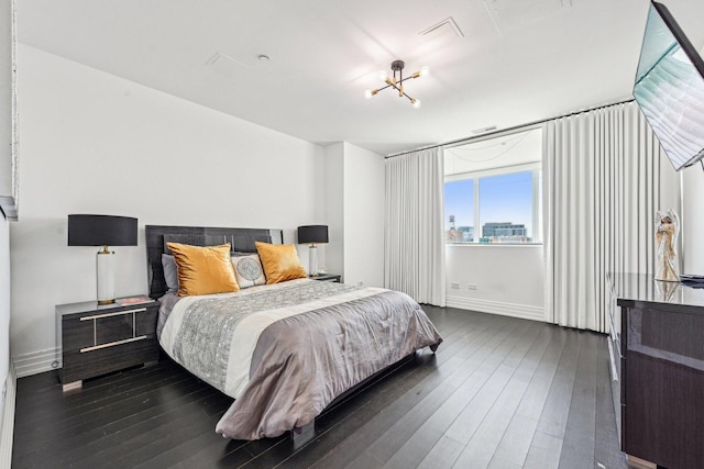 600 N Kingsbury Ave Unit 506, Chicago, IL 60610 - bedroom with dark wood-style flooring and baseboards
