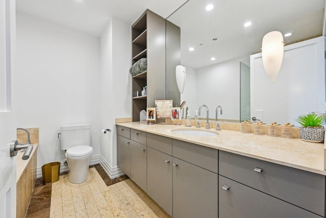 600 N Kingsbury Ave Unit 506, Chicago, IL 60610 - bathroom with vanity, toilet, recessed lighting, and a tub to relax in