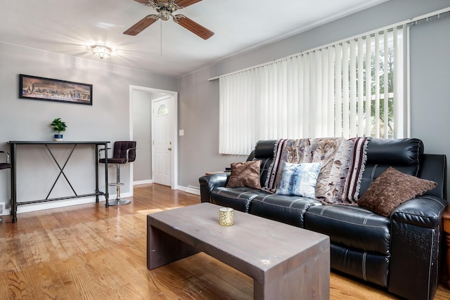 711 Parkside Dr, Rockford, IL 61108 - living room featuring ceiling fan, wood finished floors, and baseboards
