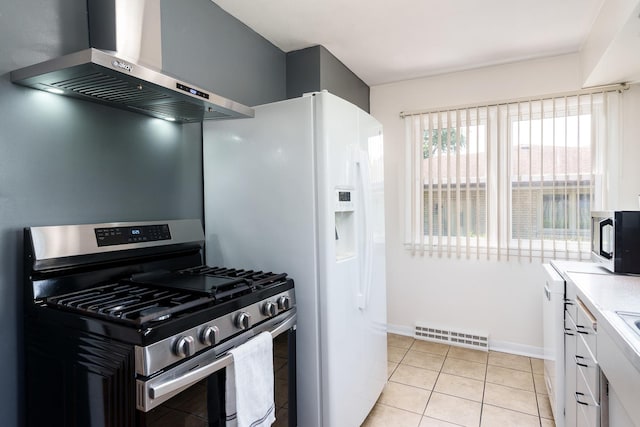 711 Parkside Dr, Rockford, IL 61108 - kitchen featuring stainless steel appliances, wall chimney exhaust hood, light countertops, white cabinets, and light tile patterned flooring