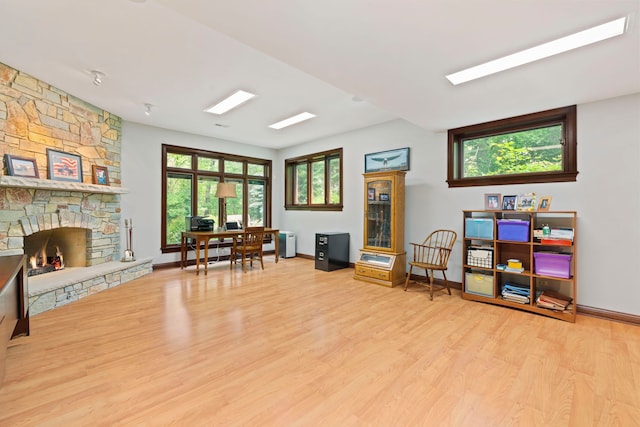 38W250 Burr Road Ln, Saint Charles, IL 60175 - home office featuring wood finished floors, baseboards, and a stone fireplace