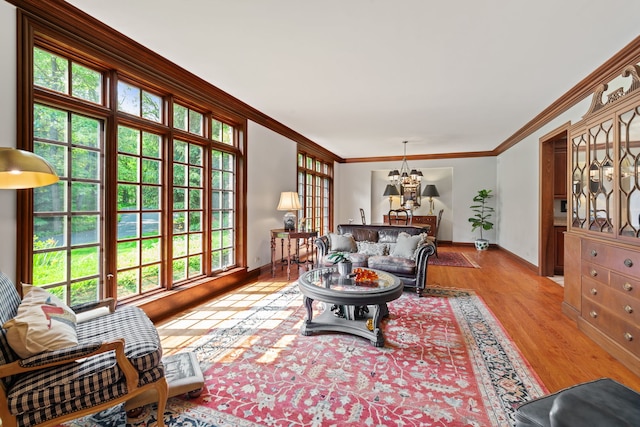 38W250 Burr Road Ln, Saint Charles, IL 60175 - living room with ornamental molding, a chandelier, light wood finished floors, and baseboards