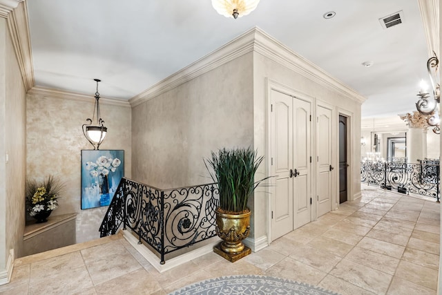 115 Carmela Ct, Bloomingdale, IL 60108 - corridor featuring crown molding, an upstairs landing, and a chandelier