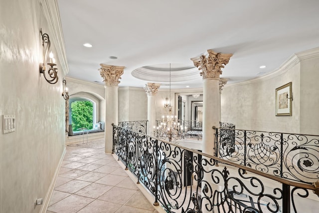 115 Carmela Ct, Bloomingdale, IL 60108 - corridor with decorative columns, crown molding, a chandelier, tile patterned flooring, and baseboards