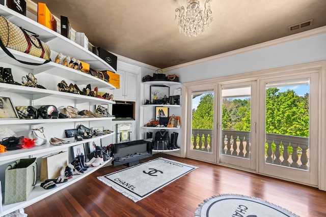 115 Carmela Ct, Bloomingdale, IL 60108 - interior space featuring wood finished floors and a chandelier