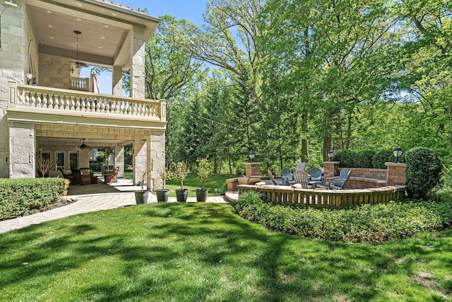 115 Carmela Ct, Bloomingdale, IL 60108 - view of green lawn with a balcony, ceiling fan, and a patio