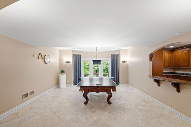 115 Carmela Ct, Bloomingdale, IL 60108 - rec room with baseboards, arched walkways, and recessed lighting