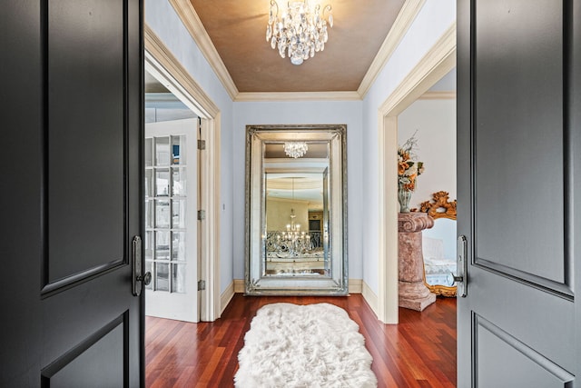 115 Carmela Ct, Bloomingdale, IL 60108 - foyer entrance with a chandelier, crown molding, dark wood-style flooring, and baseboards