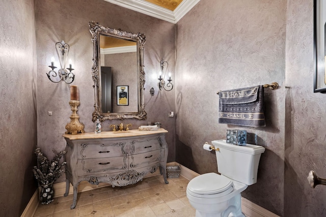 115 Carmela Ct, Bloomingdale, IL 60108 - bathroom with crown molding, vanity, toilet, baseboards, and tile patterned flooring