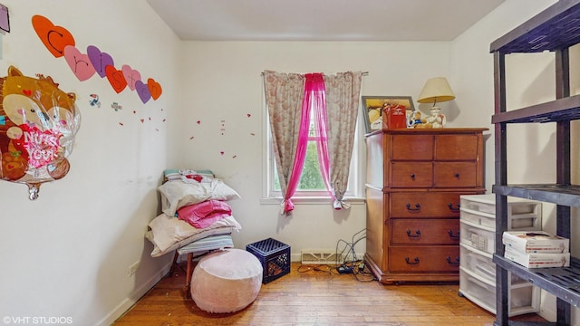 14301 S Halsted St, Riverdale, IL 60827 - bedroom with wood-type flooring and baseboards