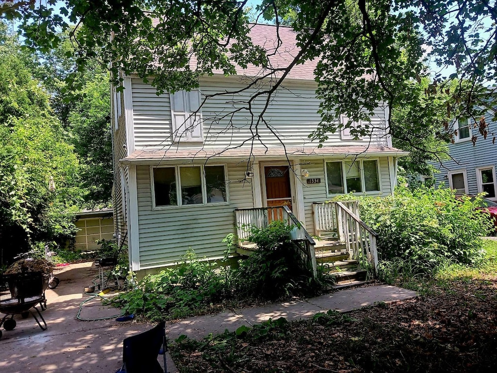 1334 Gates St, Montgomery, IL 60538 - view of front facade featuring a patio and roof with shingles