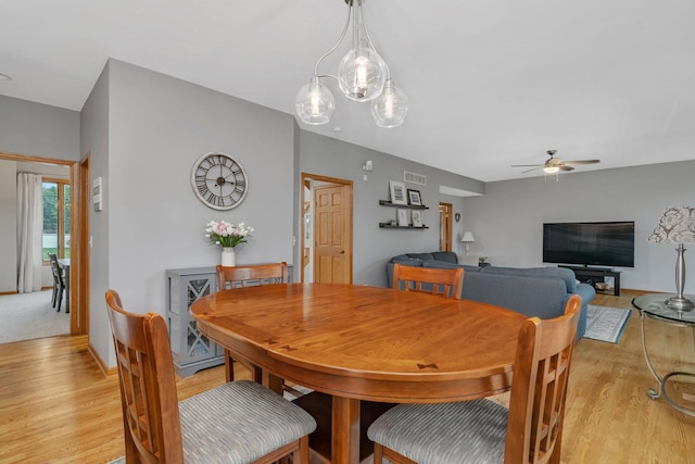 507 Cambridge Ln, Shorewood, IL 60404 - dining space with light wood-type flooring and ceiling fan