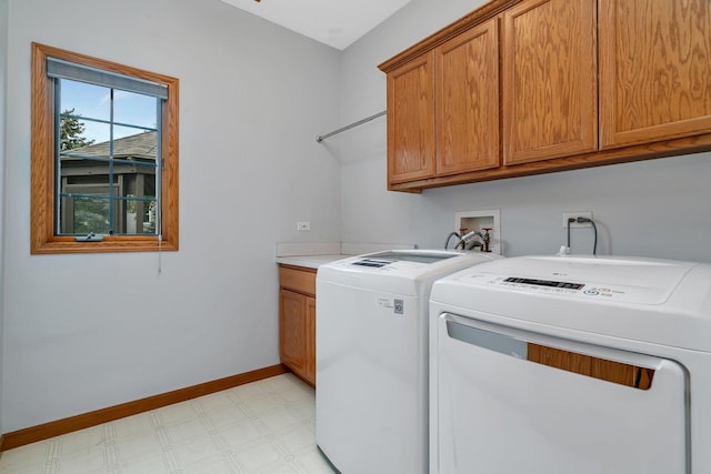 507 Cambridge Ln, Shorewood, IL 60404 - washroom with cabinet space, washer and clothes dryer, and light flooring