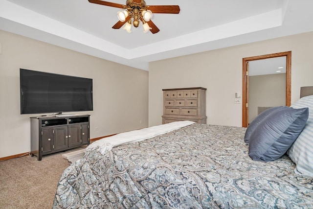 507 Cambridge Ln, Shorewood, IL 60404 - bedroom featuring light colored carpet, a raised ceiling, and ceiling fan