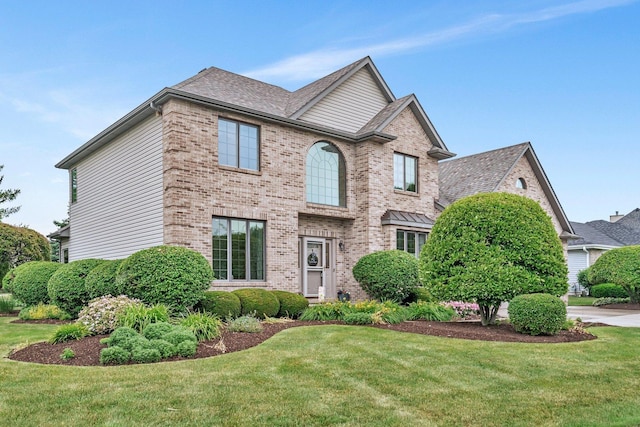 507 Cambridge Ln, Shorewood, IL 60404 - traditional-style home with brick siding and a front yard