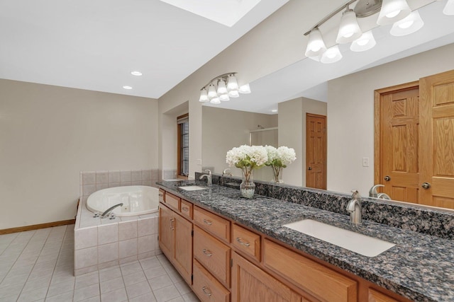 507 Cambridge Ln, Shorewood, IL 60404 - bathroom featuring tile patterned flooring, double vanity, a bath, an enclosed shower, and a skylight