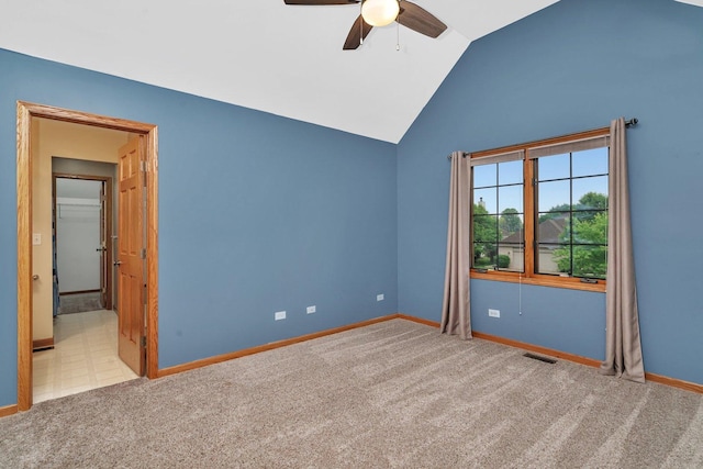 507 Cambridge Ln, Shorewood, IL 60404 - carpeted empty room with a ceiling fan and vaulted ceiling