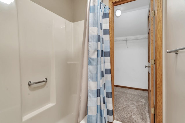 507 Cambridge Ln, Shorewood, IL 60404 - bathroom with baseboards and shower / tub combo with curtain