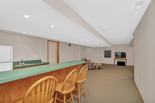 507 Cambridge Ln, Shorewood, IL 60404 - indoor bar with recessed lighting, carpet flooring, and freestanding refrigerator