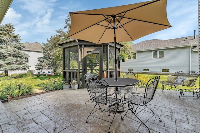 507 Cambridge Ln, Shorewood, IL 60404 - view of patio / terrace featuring a sunroom and outdoor dining area