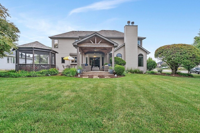 507 Cambridge Ln, Shorewood, IL 60404 - view of front facade featuring outdoor lounge area, a front yard, and a chimney